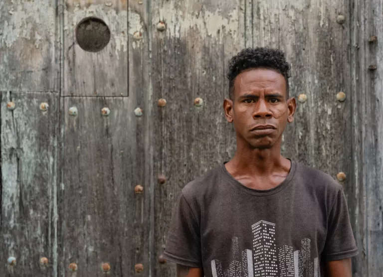 Bárbaro lives in the Tiboli neighborhood of Santiago de Cuba. His job is to find tourists and take them to restaurants where he will earn a small commission