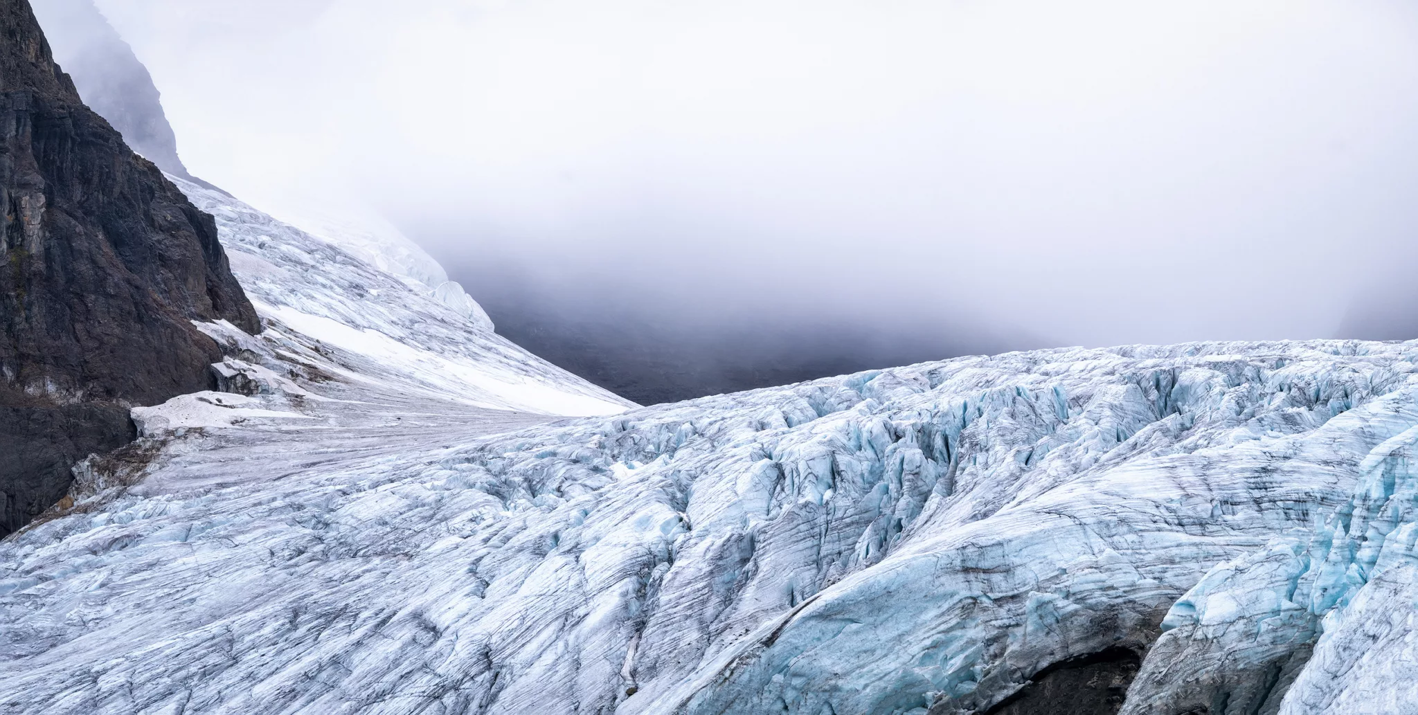 Weather moving in over a glacier on the Svalbard archipelago in the Arctic ocean
