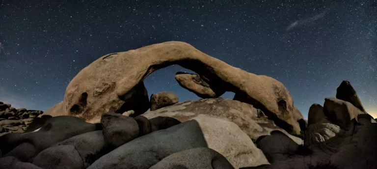 Clear starry night at Arch Rock - Joshua Tree National Park